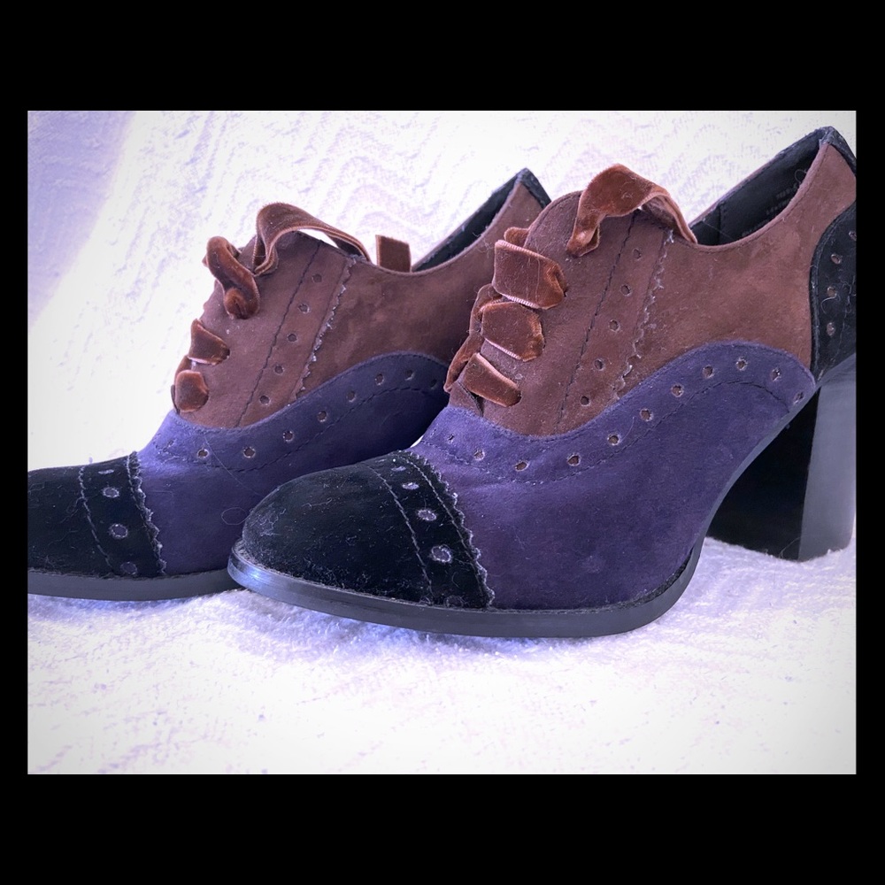 RESTRICTED brand,laced, steam punk heeled shoes.